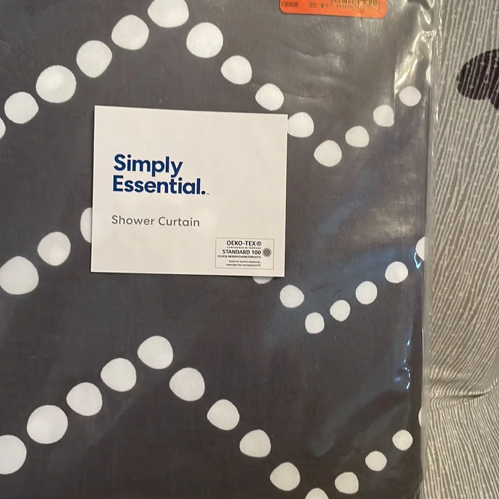 Shower curtain dark gray with white dotted chevron pattern. Great accent